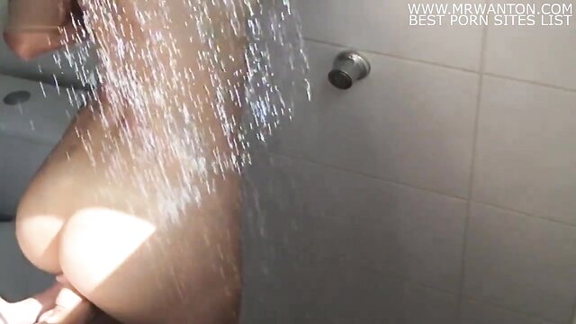 Russian 18-year-old bares it all in a steamy shower striptease, leading to a passionate self-pleasure session on Xxx Tube.