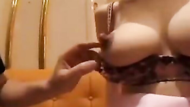 In this explicit video, a mature blonde woman encourages you to passionately suck on her creamy breasts.
