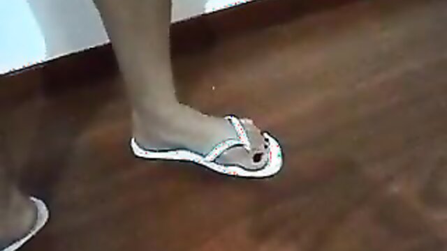 Latin Feet In White Flip Flops