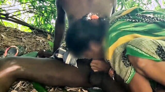 Indian village aunty gets caught on camera in a steamy forest encounter, leading to a hot 18-year-old bisexual action.