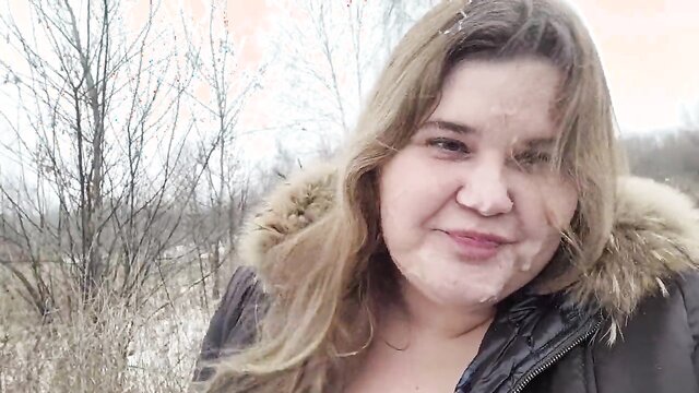 Cum on the face of a cutie with big tits, and she got excited and started taking selfies Blowjob by the car in the field, in a snowstorm. Isn\'t it beautiful?