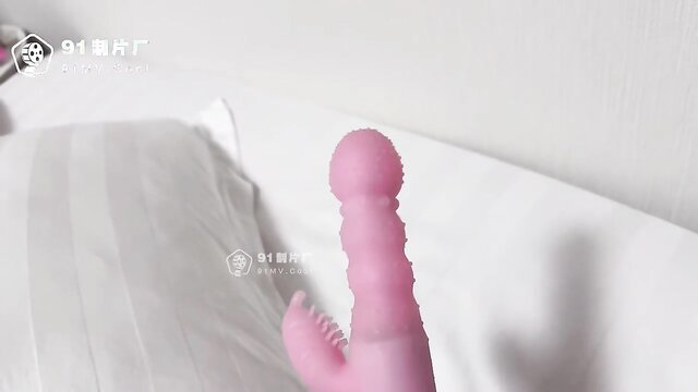 In this explicit video, a young Chinese step-sister is caught pleasuring herself in her room. The camera captures her intimate moments and their secret encounter.