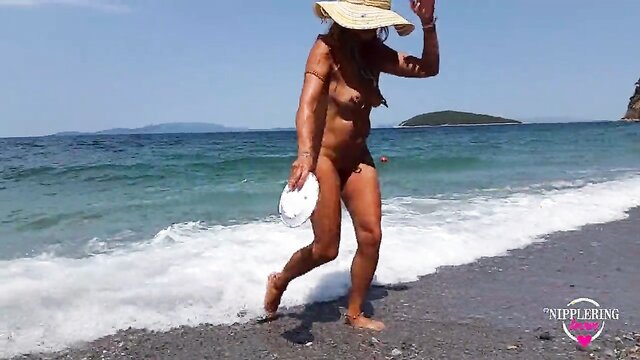 nippleringlover - horny milf on a nude beach with multiple pussy piercings, extremely stretched nipple piercings nippleringlover hot mom tanned small boobs huge pierced nipples extreme stretched nipple piercings naked outdoors at nude beach pierced pussy with stretched pussy lips hot tight ass big nipple rings