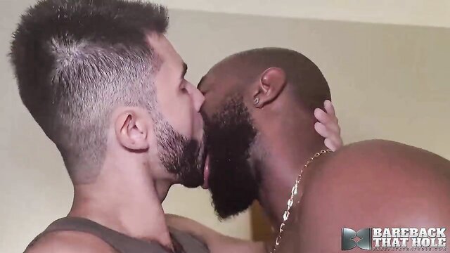 BAREBACKTHATHOLE Black Miguell Baiano Barebacks Furry Horny Hung and bearded Miguell Baiano got his monster cock devoured by bottom gay Furry Horny, who bends over for balls deep bareback!