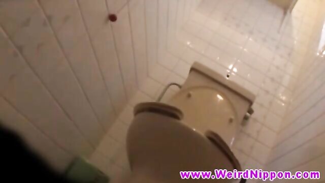 Japanese petite babes in secret footage Japanese petite babes in secret footage on the toilet