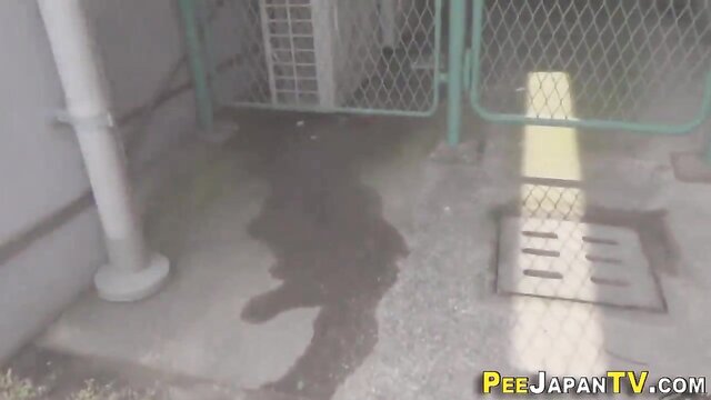 PISS JAPAN TV - Asian pees in her clothes outdoors Asian pees in her clothes outdoors in public street while running